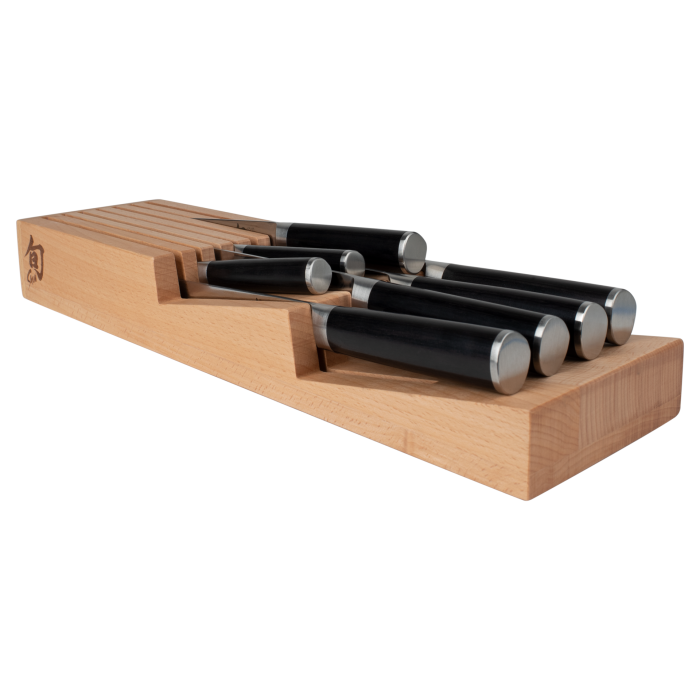 Shun In-Drawer Knife Tray with six knives, featuring black handles and metal butt caps, stored in a beechwood block with individual slots for organized storage.