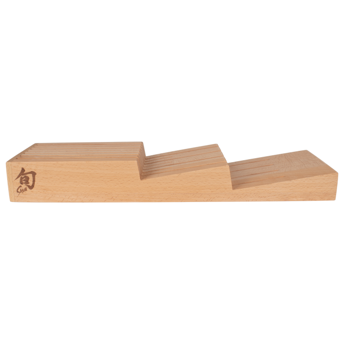 Shun | In-Drawer Knife Trays, 7 Slot: A tiered beechwood knife block with slots for up to seven knives, featuring the Shun logo on the front.