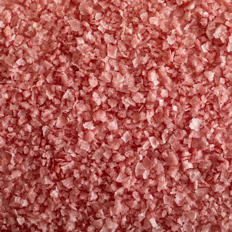 Jacobsen Salt Co. - Pinot Noir Salt, featuring pink crystal flakes, infused with Oregon Pinot Noir for rich flavor, ideal for enhancing savory and sweet dishes.