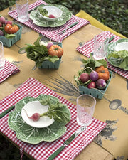 Hester & Cook | Farmer's Market Runner featuring a table setting with plates of vegetables, a knife, fork, and a glass on a checkered napkin.