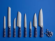 Wüsthof Classic 5 Serrated Utility Knife with blue handle, ideal for kitchen tasks, part of Athens Cooks' curated kitchen tools collection.