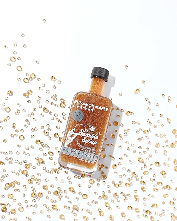 Runamok Mini Sparkle Syrup in a glass bottle, displayed on a white surface, ideal for culinary enthusiasts at Athens Cooks kitchen store.
