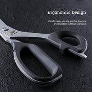 Shun | Shear Set, 2-Piece on textured surface, featuring ergonomic black handles and Japanese stainless steel blades, ideal for versatile kitchen tasks.