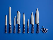 Wüsthof Classic 8 Chef's Knife Wild Blueberry displayed among other knives, highlighting its sleek design and precision blade, ideal for culinary enthusiasts.