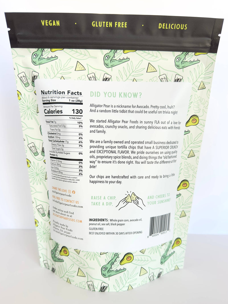 Alligator Pear Foods - Sea Salt & Pepper tortilla chips, 6oz bag, featuring a cartoon alligator with sharp teeth and resealable packaging. Perfect for dips, gluten-free.