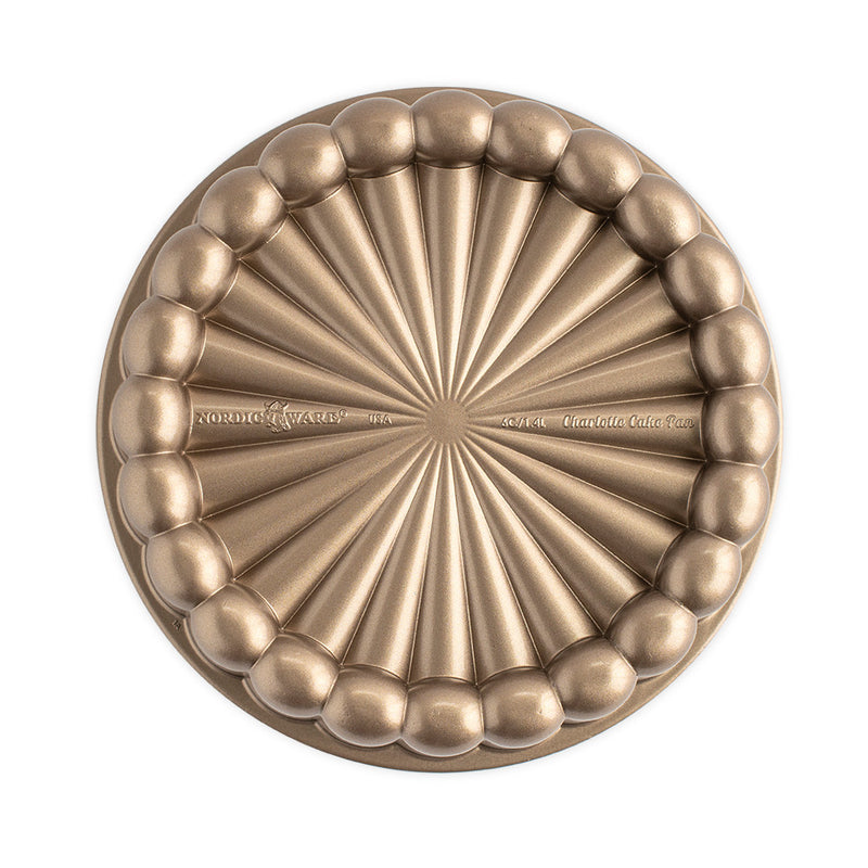 Nordic Ware | Charlotte Cake Pan, a circular bronze bakeware piece, designed for creating elegant French-style charlotte desserts, 6-cup capacity.