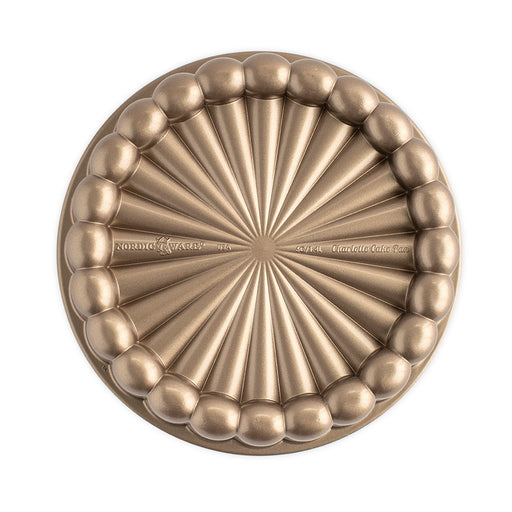 Nordic Ware | Charlotte Cake Pan, a circular bronze bakeware piece, designed for creating elegant French-style charlotte desserts, 6-cup capacity.