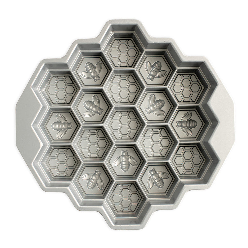 Nordic Ware | Honeycomb Pull-Apart Pan with honeycomb design, perfect for creating 19 individual cakelets, ideal for bee-themed desserts.