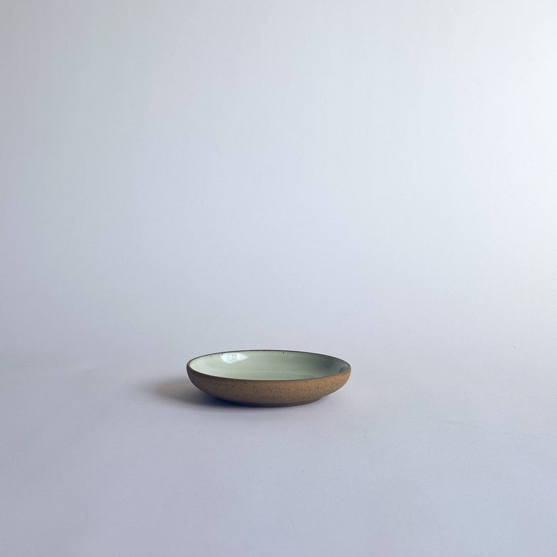 Sarah Kersten - Olive Dish: Basin Collection: Dove Grey, a versatile 6 ceramic dish, ideal for olives or bread, on a white surface. Perfect for kitchen enthusiasts.