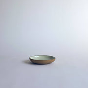 Sarah Kersten - Olive Dish: Basin Collection: Black, a small, versatile ceramic dish ideal for appetizers or sides, displayed on a white surface.
