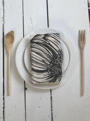 Hearth and Harrow Organic Cotton Garlic Tea Towel featuring a hand-printed garlic design, showcasing eco-friendly craftsmanship, perfect for enhancing kitchen elegance at Athens Cooks.