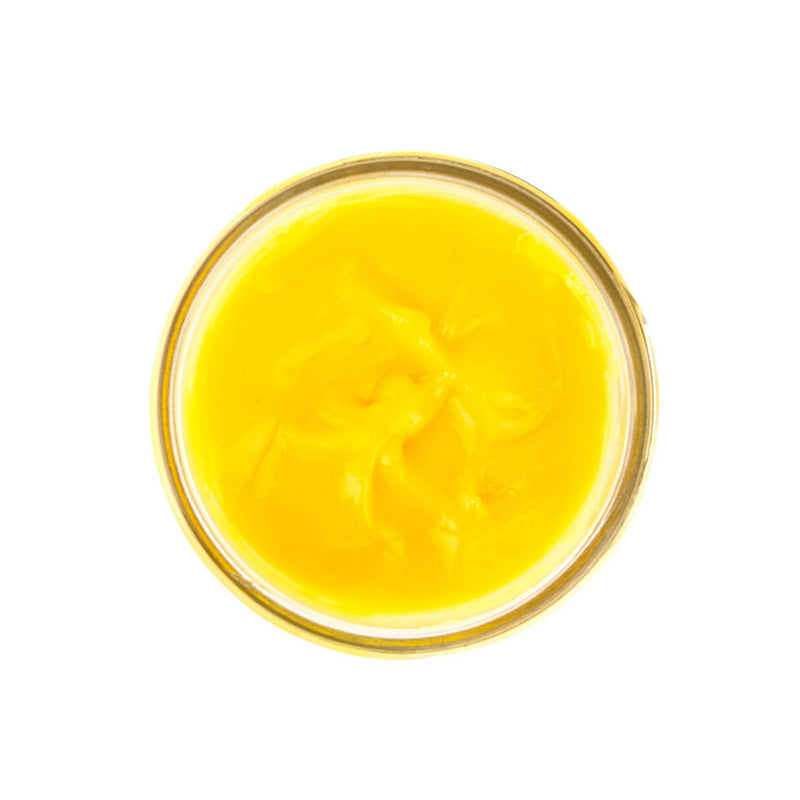 Beth's Farm Kitchen - Lemon Curd in a round glass dish, showcasing its glossy, satiny texture perfect for spreading on pancakes or pairing with mascarpone.