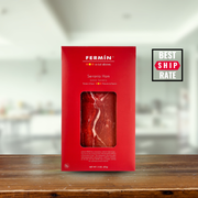 Casacella Foods - Fermin Serrano Ham Cured 18 Months 2 oz in a red box on a wooden surface, featuring a Best Ship Rate badge.