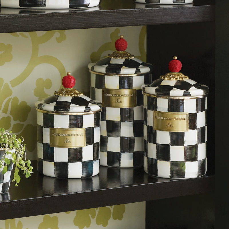 MacKenzie Childs | Courtly Check Small Canister set featuring a hand-painted checkerboard pattern with red finials, ideal for versatile kitchen or home storage.