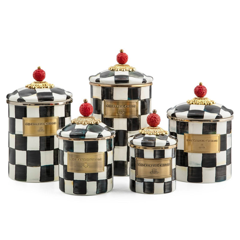 MacKenzie Childs | Courtly Check Small Canister: Set of five hand-painted ceramic canisters with black-and-white checks, gold trim, and red finial lids, ideal for versatile kitchen storage.