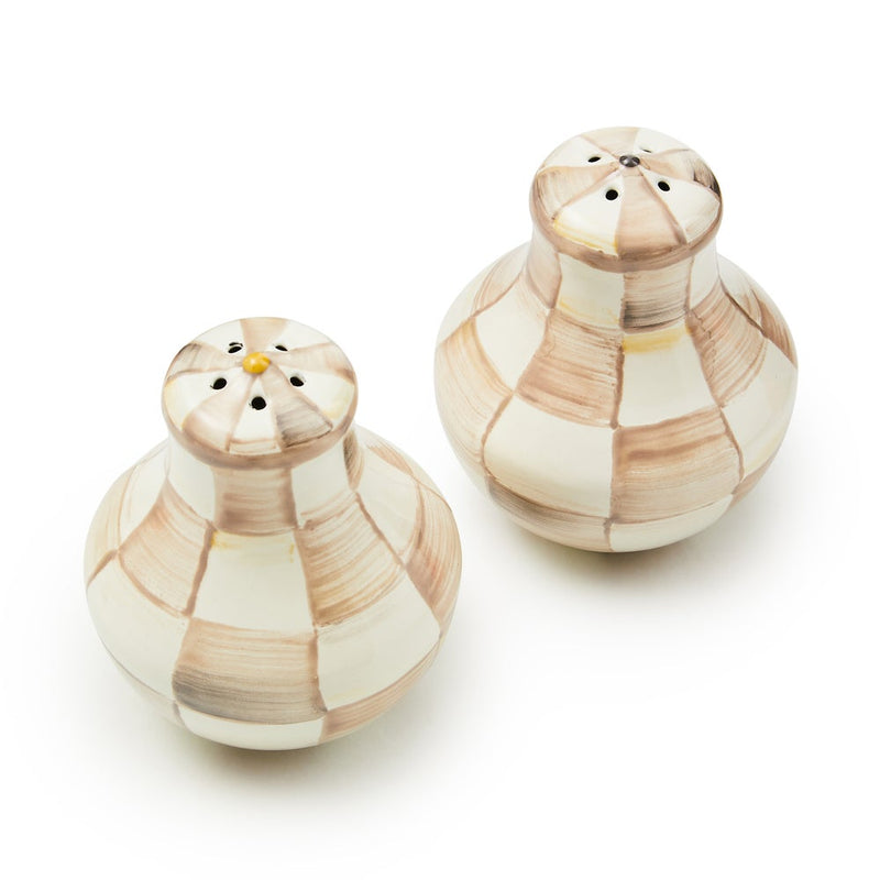 MacKenzie Childs | Mocha Check Salt & Pepper Shakers, featuring hand-painted cream and light brown checks, crafted from hand-glazed steel with silicone plugs, ideal for enhancing kitchen decor.