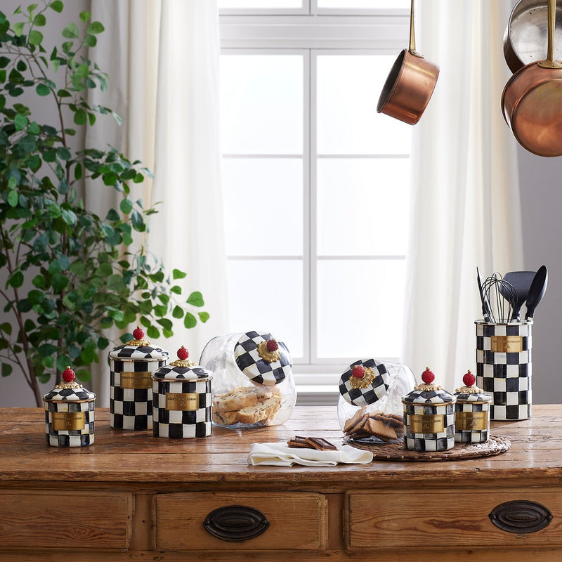 MacKenzie Childs | Cookie Jar with Courtly Check Lid displayed on a rustic table, accompanied by glass jars with cookies and a utensil crock, embodying Athens Cooks' curated kitchen aesthetics.