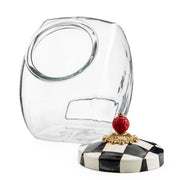 MacKenzie Childs | Cookie Jar with Courtly Check Lid: A clear glass jar with a decorative checkerboard lid, featuring a red knob for stylish kitchen storage.