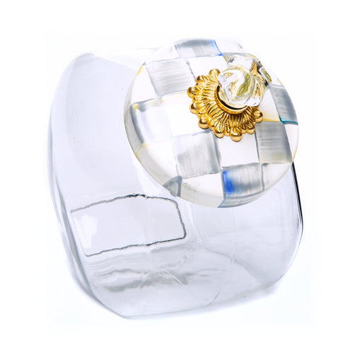 MacKenzie Childs | Cookie Jar with Sterling Check Lid features a clear glass body and a hand-painted, check-patterned lid with a gold-tone base and glass knob.
