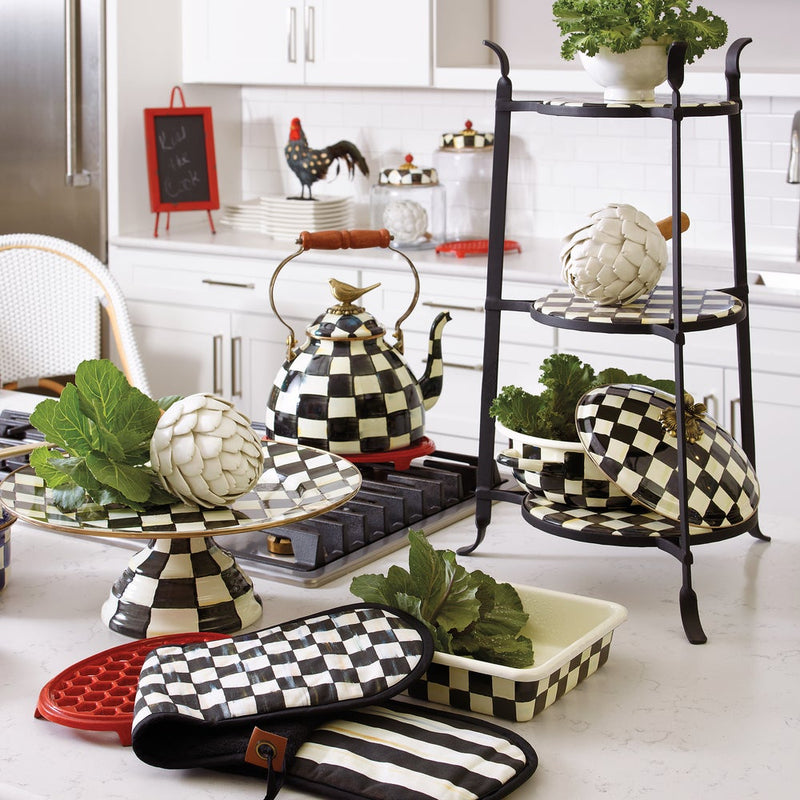 MacKenzie Childs | Courtly Check with Bird Tea Kettle, 3 QT, on a stovetop; features a signature checkerboard pattern and sparrow finial, amidst coordinated kitchenware.