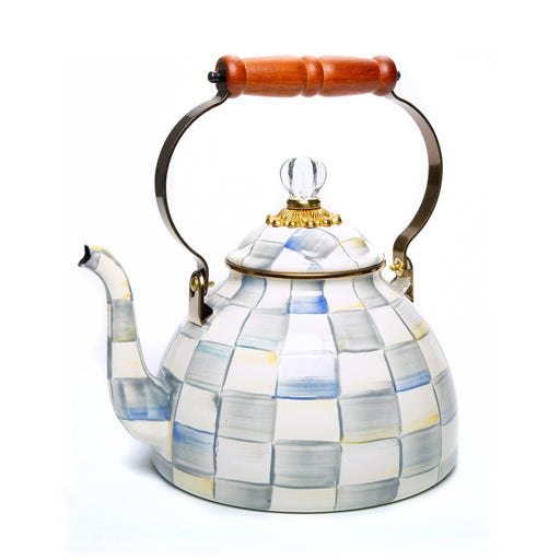 MacKenzie Childs | Sterling Check Tea Kettle, 3 QT features a hand-painted checker pattern, metal handle with wood grip, and a glass knob-topped lid, exuding elegant craftsmanship.