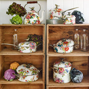 White Flower Market with Bird Tea Kettle, 3 QT, displayed among rustic crates, colorful enamel cookware, fresh vegetables, and glass jars, showcasing Athens Cooks' curated kitchen elegance.
