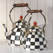 MacKenzie Childs | Courtly Check Tea Kettle, 3 QT., featuring a black-and-white checkered pattern, wooden handle, and decorative red knob, ideal for kitchen display or gifting.