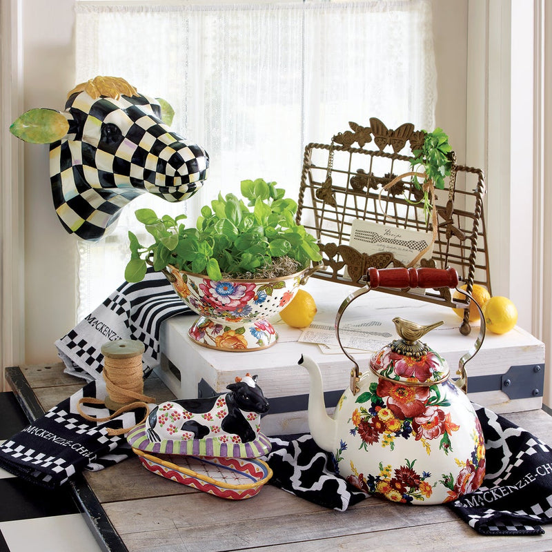 MacKenzie-Childs White Flower Market Large Colander featured in a country-style kitchen setup, surrounded by charming décor, perfect for adding elegance to kitchen tasks.