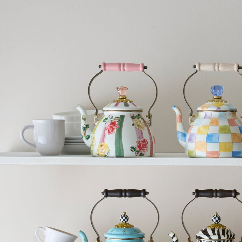 Mackenzie Childs Garden Gala Tea Kettle, 2 QT, floral-striped with pink handle, displayed on shelf among decorative tea sets at Athens Cooks.