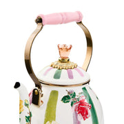 Mackenzie Childs | Garden Gala Tea Kettle, 2 QT. features a floral porcelain design, brass-tone handle with pink grip, and rose-shaped lid finial, ideal for stylish stovetops.