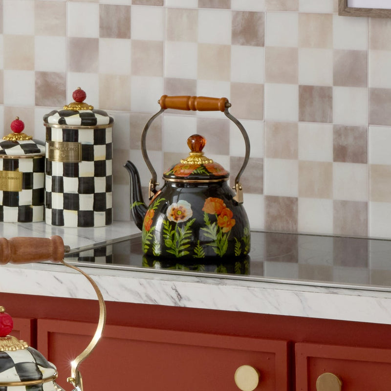 Mackenzie Childs | Poppy Tea Kettle, 2 QT, with floral design and wooden handle, centered on a stovetop with matching ceramic canisters in a kitchen setting.