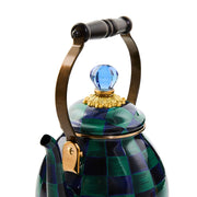 Mackenzie Childs | Juniper Check Tea Kettle, 2 QT., featuring a ceramic checkerboard design, metal handle with wood grip, and blue glass knob, perfect for stylish stovetops.