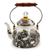 MacKenzie Childs | Sterling English Garden Tea Kettle, 2 QT: Vintage-style white enamel kettle with black florals, acacia handle, and glass-topped lid, ideal for classic kitchen settings.