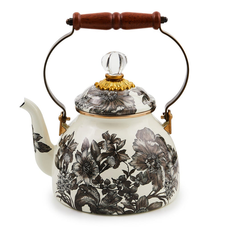 MacKenzie Childs | Sterling English Garden Tea Kettle, 2 QT: Vintage-style white enamel kettle with black florals, acacia handle, and glass-topped lid, ideal for classic kitchen settings.