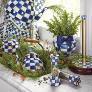MacKenzie Childs | Royal Check Tea Kettle, 2 QT., with blue-and-white checks, complements a decorative vignette of ceramics and foliage on a marble-top sink area.