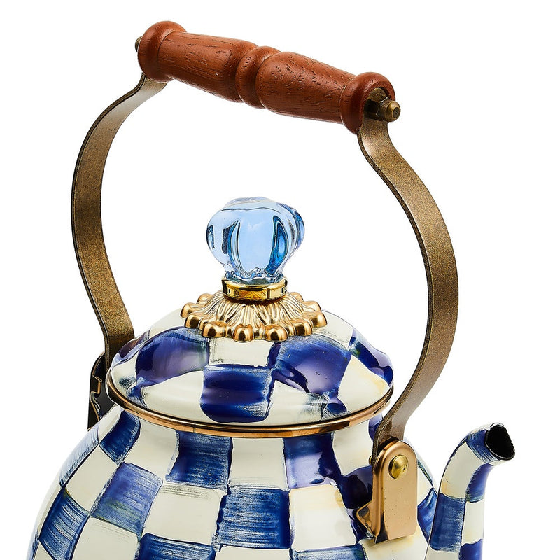 MacKenzie Childs | Royal Check Tea Kettle, 2 QT., featuring a blue-and-white checkerboard pattern, brass-tone accents, and a wooden handle, topped with a blue glass knob.