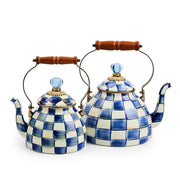 MacKenzie Childs | Royal Check Tea Kettle, 2 QT., featuring hand-painted blue-and-white checks, brass accents, glass knob, and wooden handle, perfect for kitchen decor.