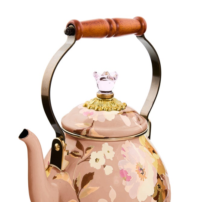 MacKenzie-Childs Wild Rose Mauve Tea Kettle, 2 Qt, features a soft pink floral design, wooden handle, and crystal-like knob, blending elegance with functionality.