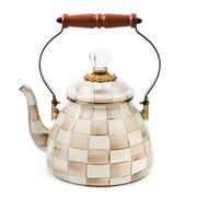 MacKenzie Childs | Mocha Check Tea Kettle, 2 QT: Ceramic teapot with coffee-colored checkerboard, wooden handle, curved spout, and glass finial, embodying elegant craftsmanship.