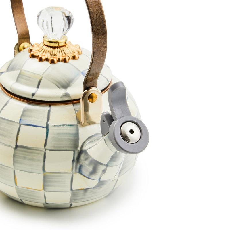 MacKenzie Childs | Sterling Check Whistling Tea Kettle with hand-painted gray checks, clear knob, and curved handle, embodying Athens Cooks' curated kitchen elegance.