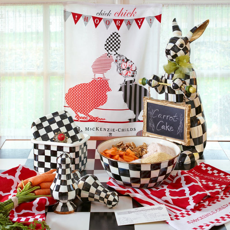 MacKenzie-Childs | Courtly Check Recipe Box accompanies a checkered kitchen vignette, featuring a mixing bowl, rabbit figurine, canister, and carrot-themed decor for baking enthusiasts.