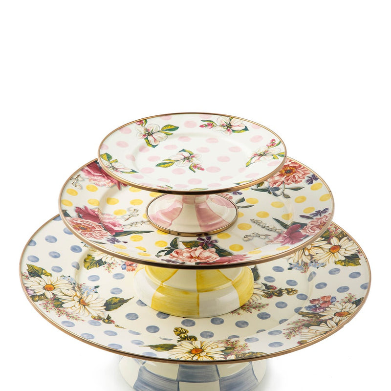 MacKenzie Childs | Wildflowers Blue Large Pedestal Platter: A three-tiered ceramic stand with pastel floral and polka-dot designs, perfect for serving tea-time treats.