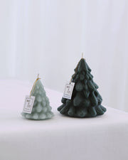 Mo&Co Home Exclusive: Sculpted Beeswax Trees, two sizes, feature hand-poured, intricate designs, ideal for elegant holiday decor and gifting, reflecting vintage and contemporary styles.
