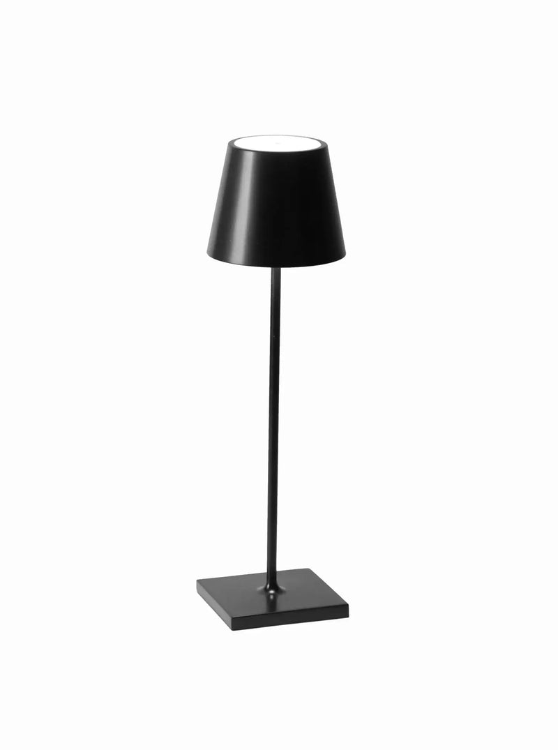 Zafferano America - Poldina Pro Cordless Lamp: Rust, a sleek, modern black metal lamp with a square base and cylindrical shade, ideal for indoor/outdoor use.