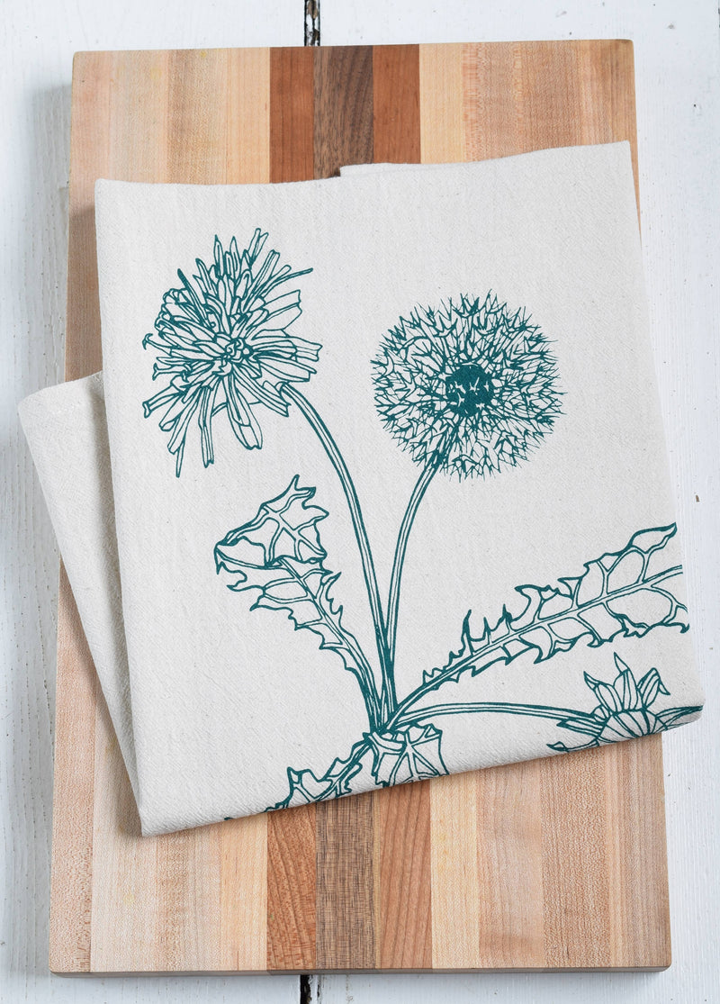 Hearth and Harrow - Organic Cotton Dandelion Tea Towel, featuring a green dandelion design, hand-printed in Rockport, Maine, on a large flour sack towel.