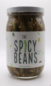 Evergreen and Market - The Spicy Beans: 16 oz jar of pickled green beans with spices, ideal for enhancing dishes, available at Athens Cooks, a specialty kitchen store.