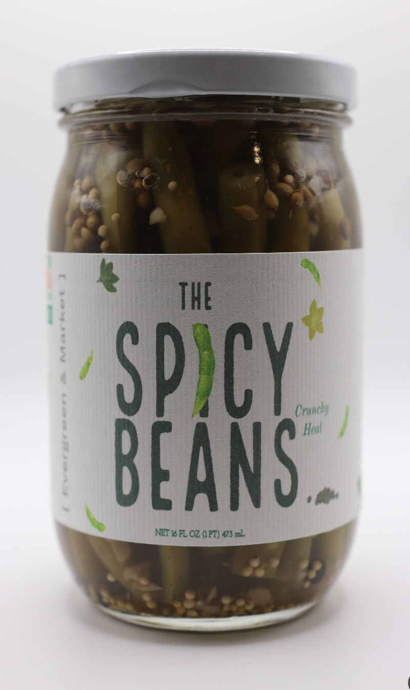 Evergreen and Market - The Spicy Beans: 16 oz jar of pickled green beans with spices, ideal for enhancing dishes, available at Athens Cooks, a specialty kitchen store.