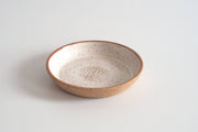 RachaelPots - Garlic Scraper: Sage, a round, ceramic dish with textured center, transforms garlic cloves into puree; hand-thrown stoneware from Brooklyn, perfect for cooking enthusiasts.