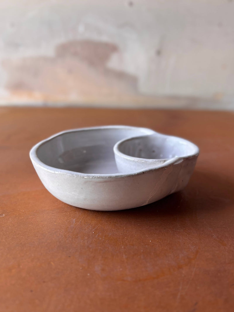 ROB Ceramics - Olive Serving Bowl Handmade: White, a dual-compartment ceramic bowl for snacks and dip, ideal for tidy entertaining and charcuterie presentations.