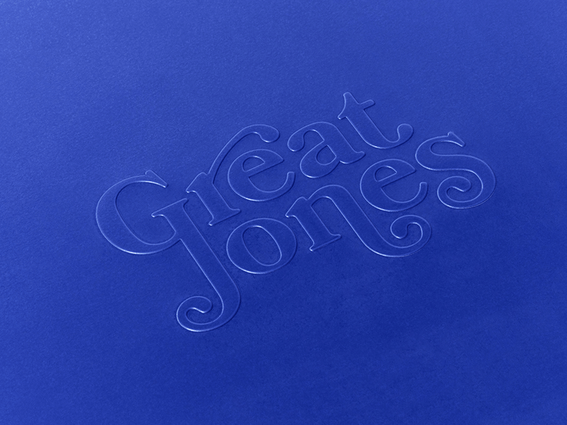 Great Jones | Holy Sheet - Pepper, a versatile half-sized sheet pan with a custom nonstick ceramic coating, ideal for easy cleanup and oven-safe use.